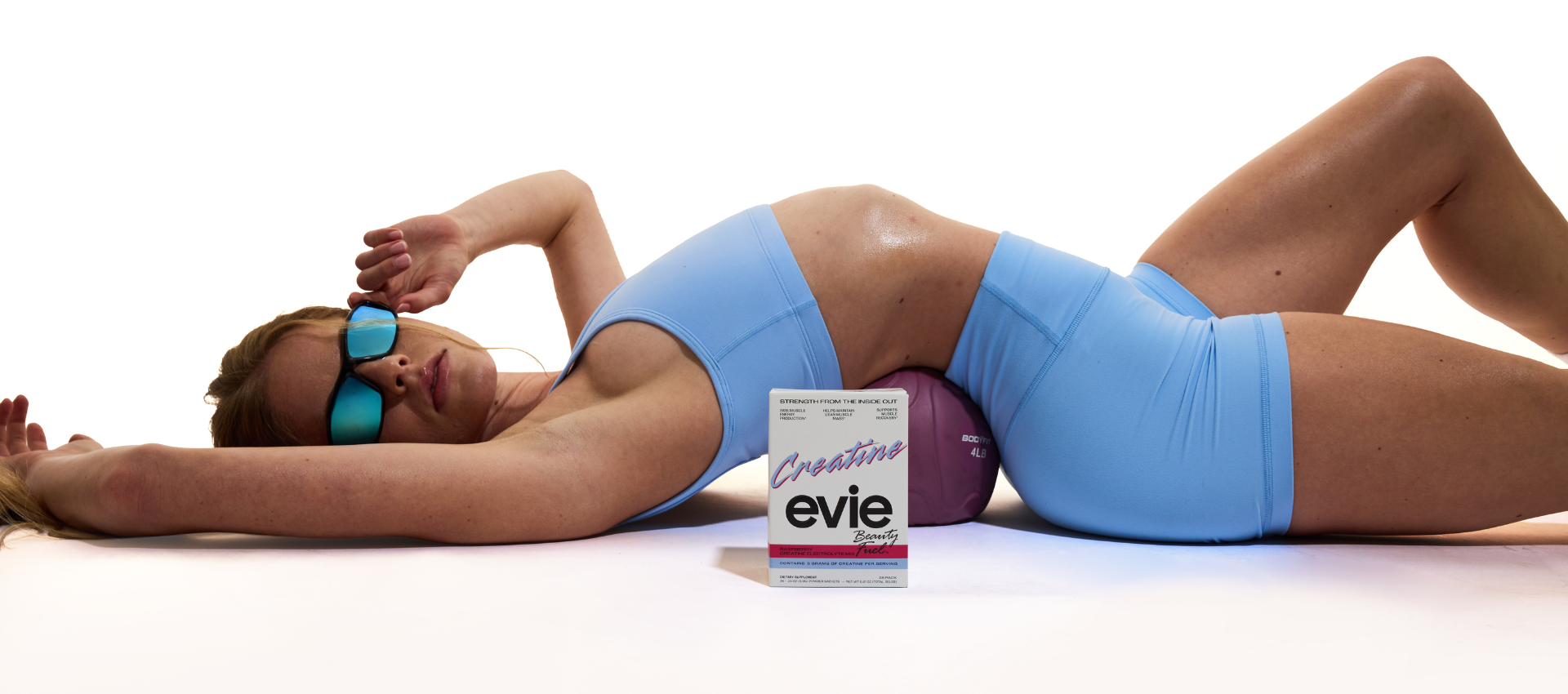 Woman lying on the floor after working out